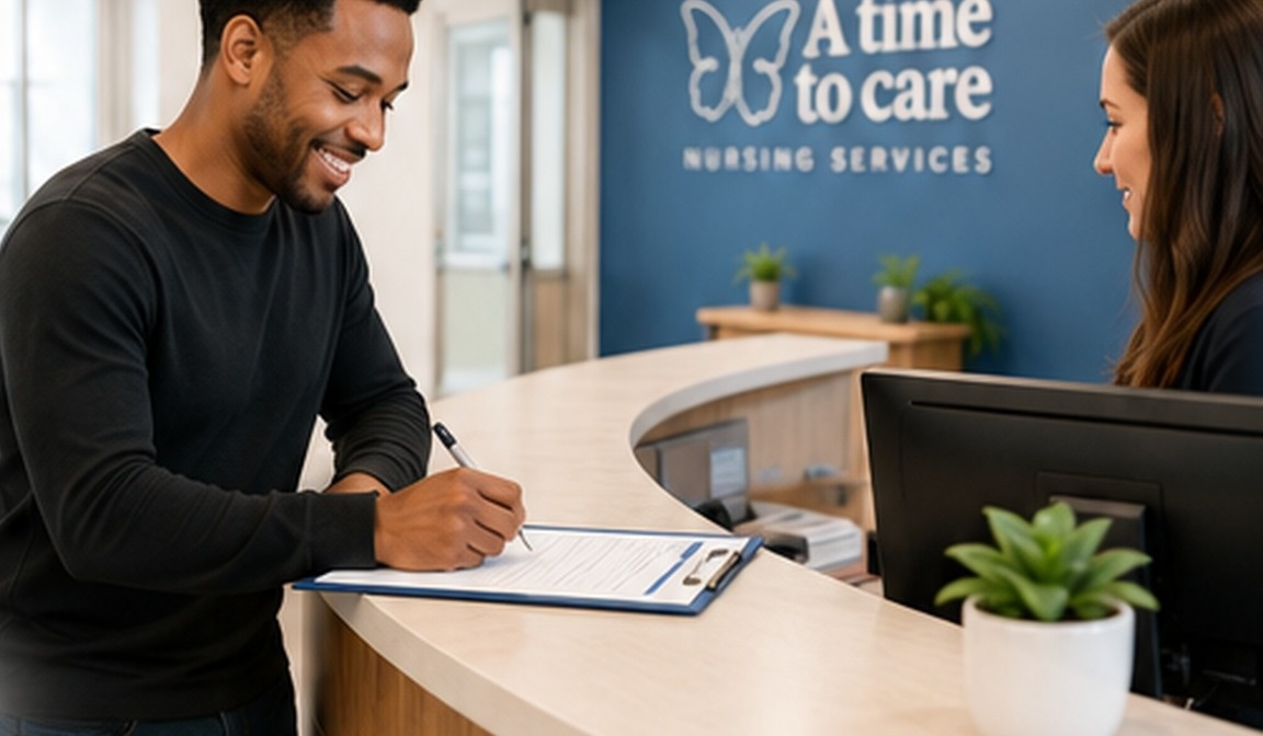 Person completing an application at the front desk